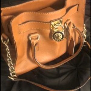 2 Michael Kors handbags